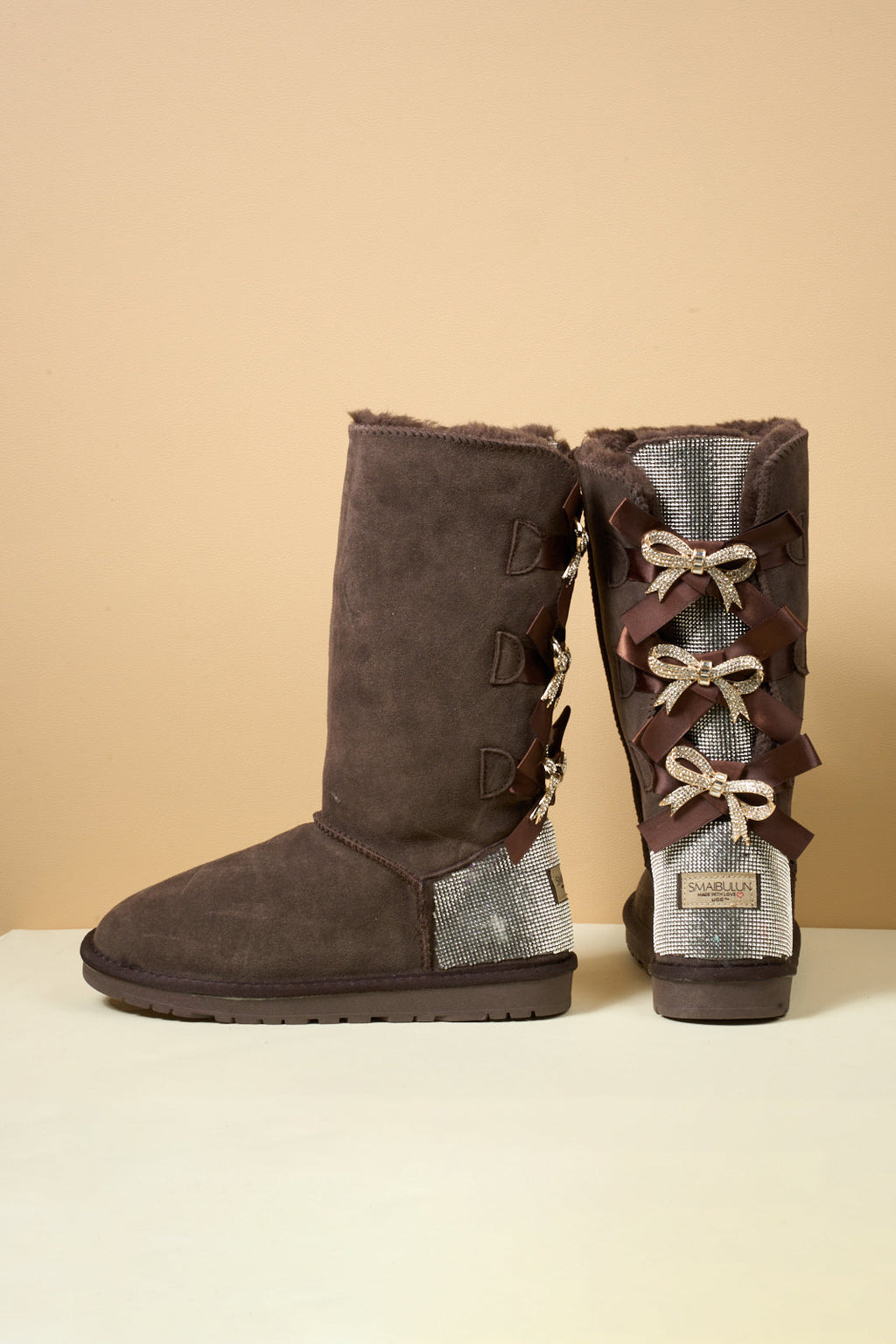 UGG Rhinestone Ribbon Tri-Tie Bow Suede Boots - Brown