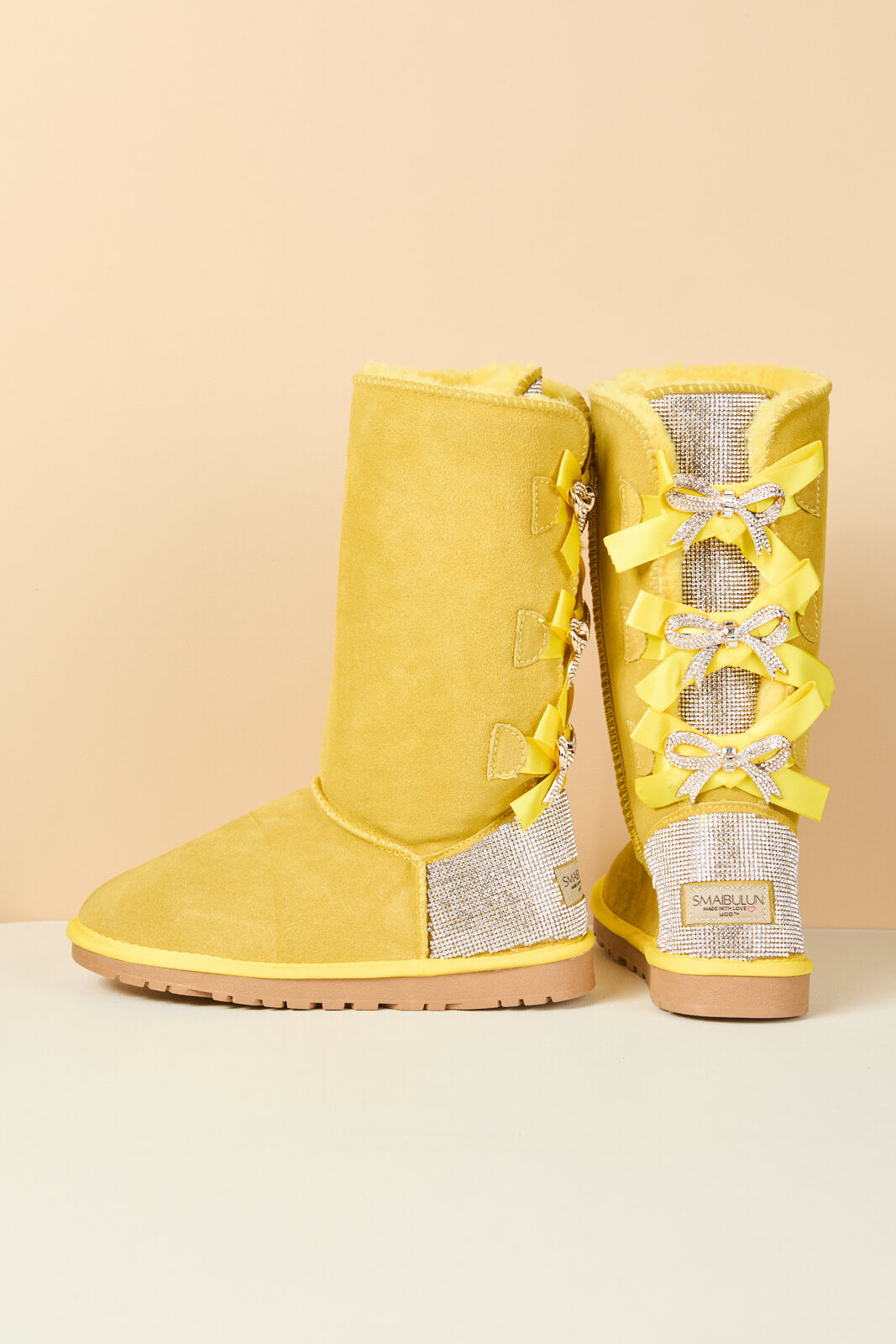 UGG Rhinestone Ribbon Tri-Tie Bow Suede Boots - Lemon