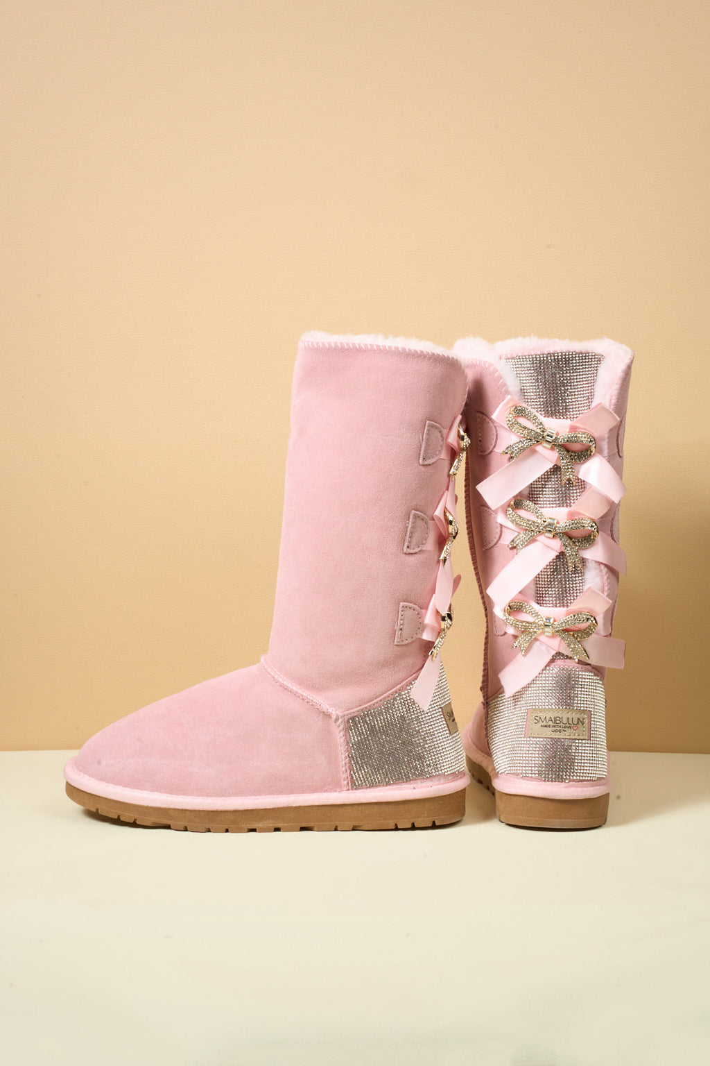 UGG Rhinestone Ribbon Tri-Tie Bow Suede Boots - Pink
