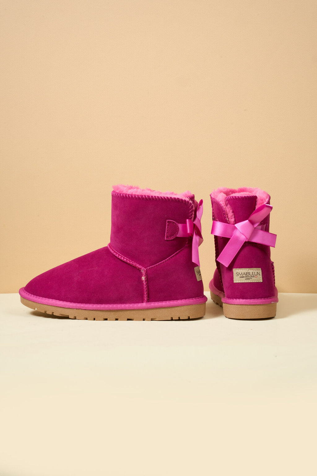 UGG Bailey Bow UGG Mini Boots - Fuchsia