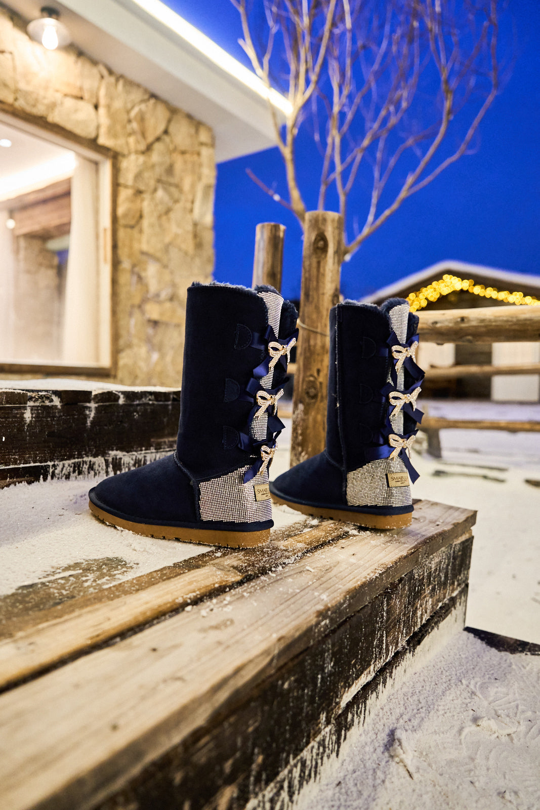 UGG Rhinestone Ribbon Tri-Tie Bow Suede Boots - Navy